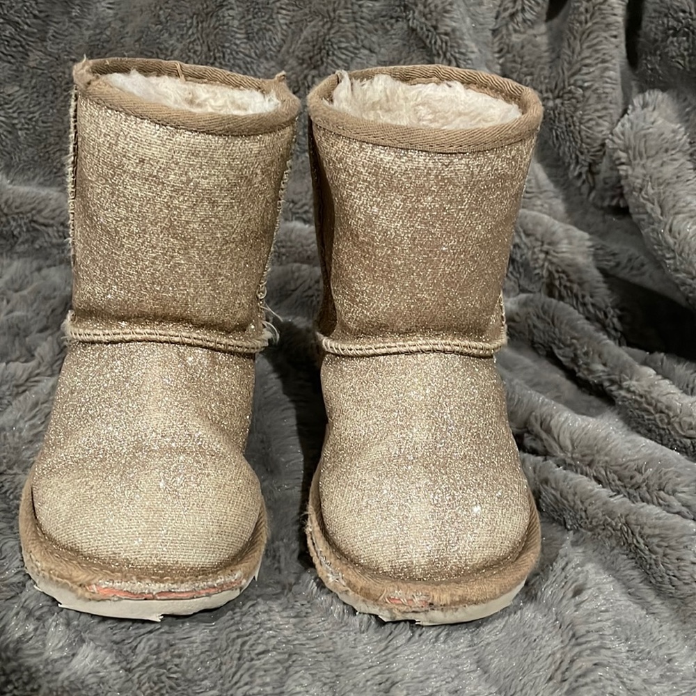 girls gold No point flat boots with glitter accents rubber soles.